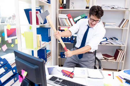 Busy frustrated businessman angry in the officeの写真素材
