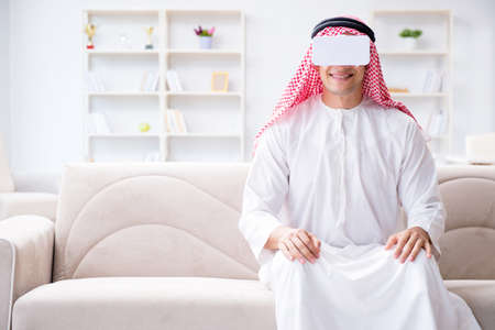 Arab man with virtual reality glassesの写真素材