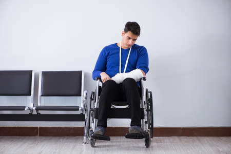 Desperate man waiting for his appointment in hospital with broke