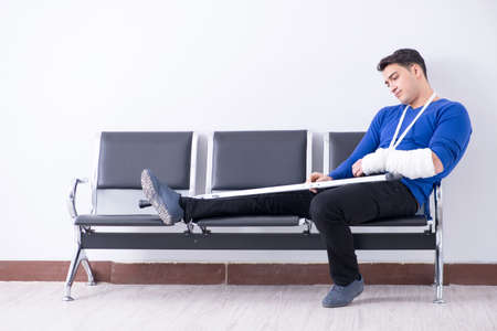 Desperate man waiting for his appointment in hospital with broke