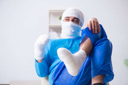 Man suffering from multiple broken bones and fractures