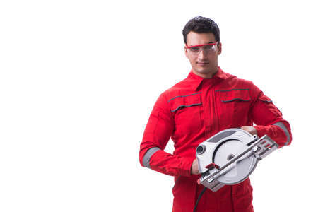 Male carpenter with circular saw in woodworking concept isolatedの写真素材