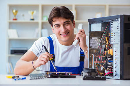 Computer hardware repair and fixing concept by experienced technの写真素材