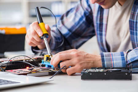 Computer hardware repair and fixing concept by experienced techn