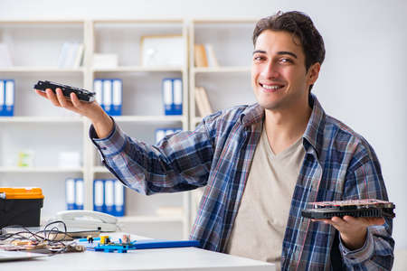 Computer hardware repair and fixing concept by experienced techn
