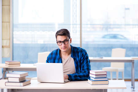 Student in telelearning distance learning concept reading in libの写真素材