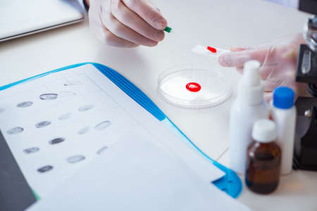 Drug synthesis lab experimentnig with pillsの写真素材