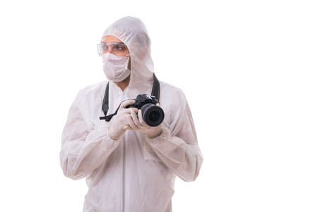 Forensic specialist in protective suit taking photos on whiteの写真素材