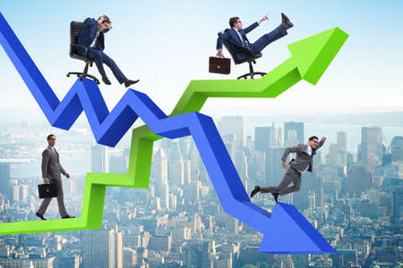 Growth and decline concept with businessmenの写真素材