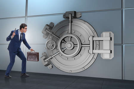 Man with gun stealing money from bankの写真素材