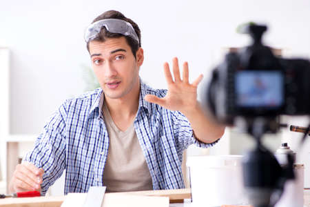 DIY blogger recording video of woorworking hobbyの写真素材