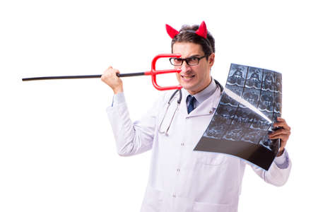 Devil doctor in funny medical concept isolated on white backgrouの写真素材