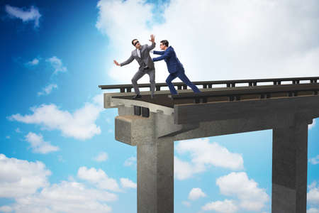 Business unethical competition concept with businessmenの写真素材