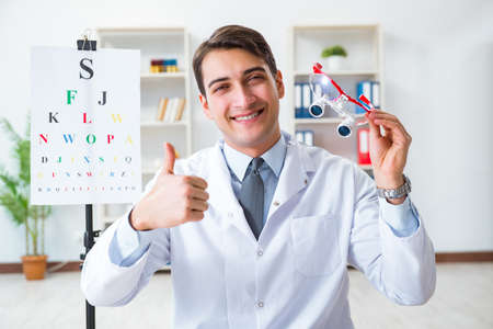 Eye doctor in eyecare concept in hospitalの写真素材