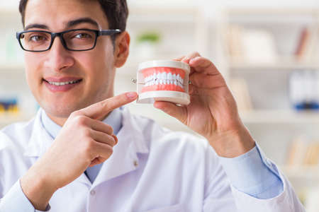 Young dentist working in the dentistry hospital