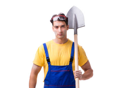 Contractor in blue coveralls with spade on white backgroundの写真素材
