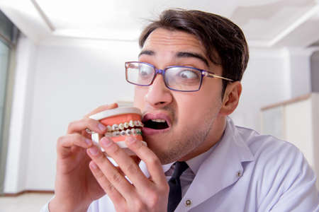 Dentist in medical concept in hospitalの写真素材