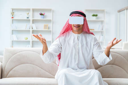Arab man with virtual reality glasses