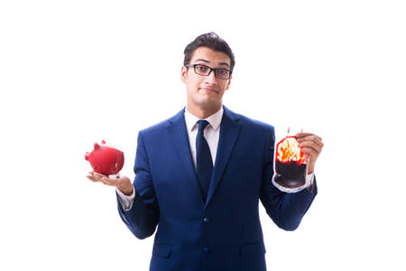 Businessman with blood bag isolated on whiteの写真素材