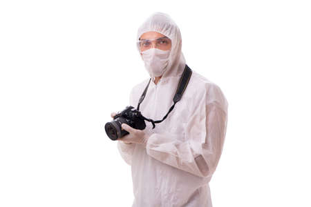 Forensic specialist in protective suit taking photos on whiteの写真素材