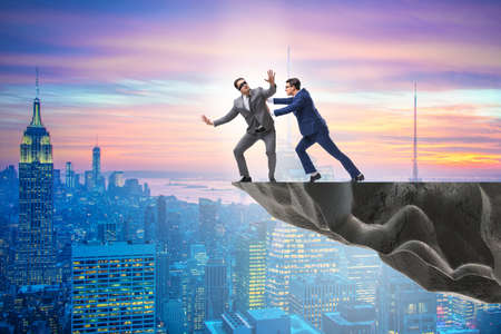 Business unethical competition concept with businessmenの写真素材