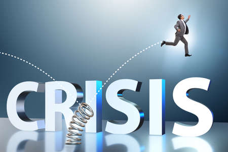 Businessman jumping from spring in business conceptの写真素材