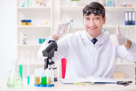 Young chemical scientist working in lab