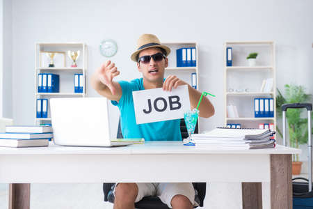 Businessman holding message in officeの写真素材