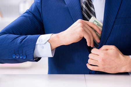 Businessman receiving his salary and bonus