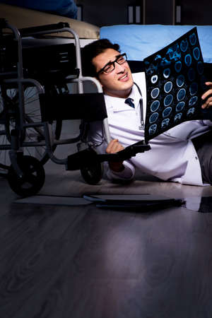 Doctor working night shift in hospital after long hours