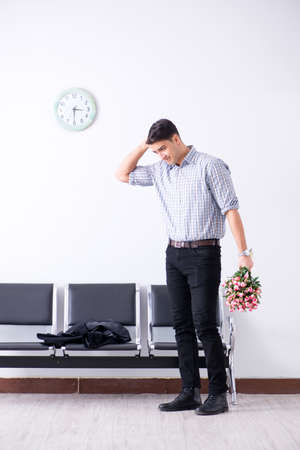 Happy dad waiting for news in maternity houseの写真素材