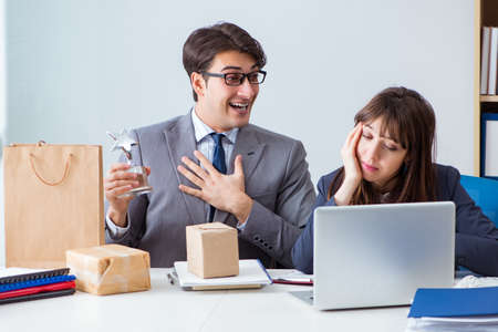 Business people receiving new mail and parcelsの写真素材