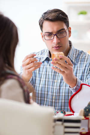 Woman visiting jeweler for jewelery evaluationの写真素材