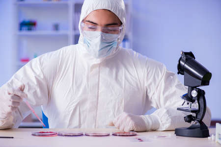 Lab assistant testing blood samples in hospital