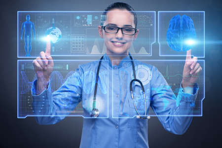 Woman doctor in telemedicine futuristic conceptの写真素材