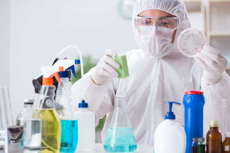 Chemist checking the quality of bathroom supplies