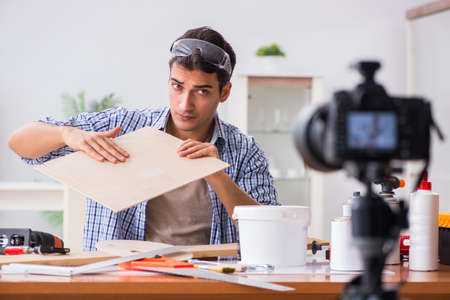 DIY blogger recording video of woorworking hobbyの写真素材