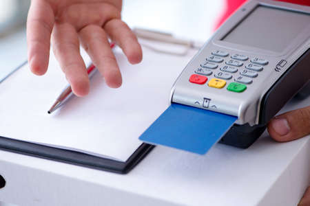 Pizza delivery being paid with pos and credit card