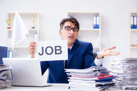 Businessman throwing white flag and giving up