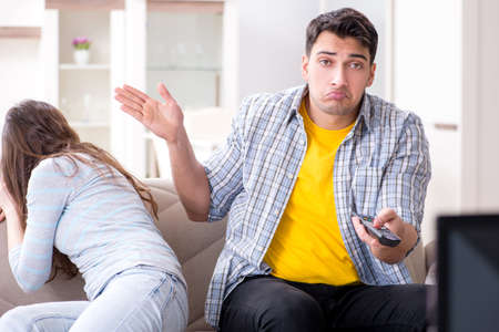 Pair watching tv at homeの写真素材