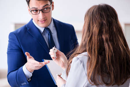 Real estate agent showing new apartment to ownerの写真素材
