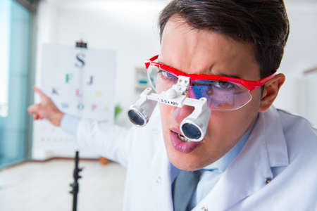 Eye doctor in eyecare concept in hospital