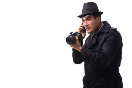 Spy with camera taking pictures isolated on white background