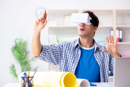 Young designer with virtual reality VR glasses