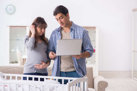 Young parents expecting their first babyの写真素材