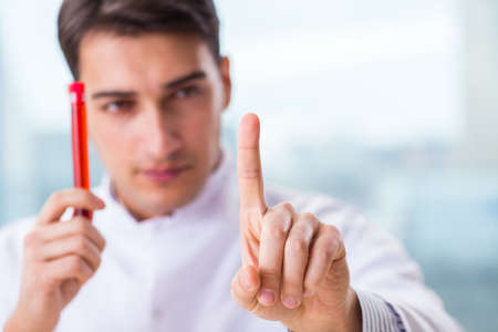 Male chemist working in lab