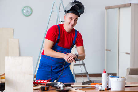 Contractor working in the workshopの写真素材