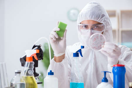 Chemist checking the quality of bathroom supplies