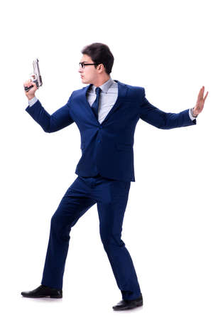 Businessman with gun isolated on white backgroundの写真素材