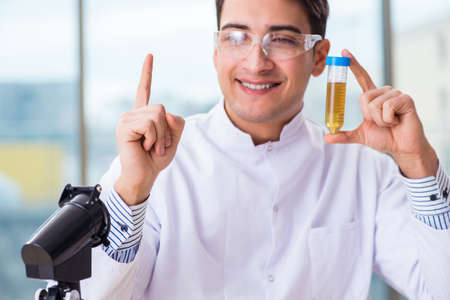 Male chemist working in labの写真素材